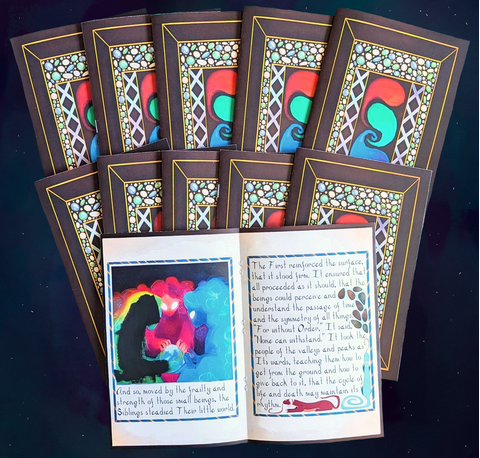 10 copies of volume 1 of "Irredeemed". The first two rows show 9 of the copies closed so the covers are visible. The last copy is open to a page spread. One of the figures on the left-hand page's illustration is covered with black acrylic paint.