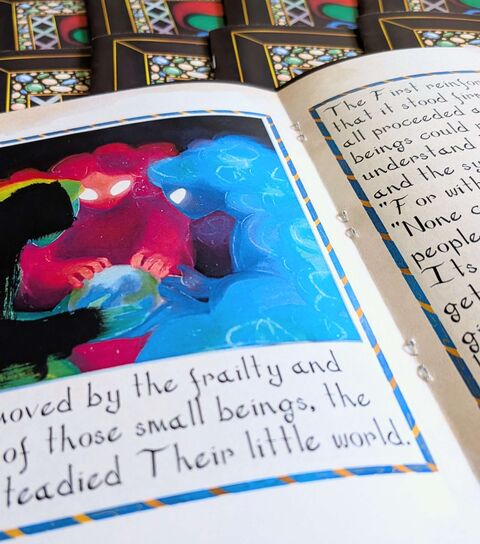 Close-up photograph of an open copy of the zine.