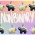 Two stegosaurus charms in an alternating pattern in two rows along the top and bottom of the image. One charm is pastel yellow with pastel purple back plates and black eyes. The other is black with yellow plates and purple eyes. "Nonbinary" is handwritten in the middle of the image between the two rows. The background is an unevenly translucent white grid overlaying a pastel rainbow gradient.